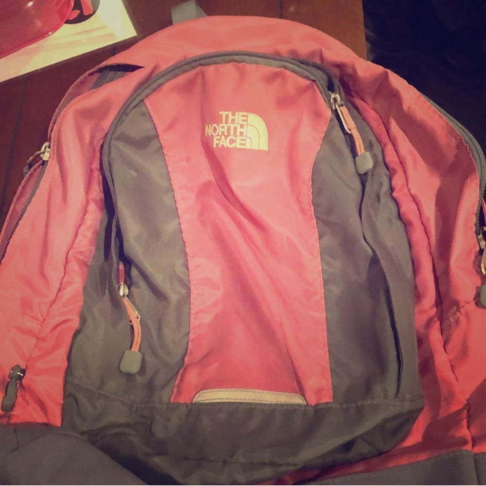 North face pink and grey book sack